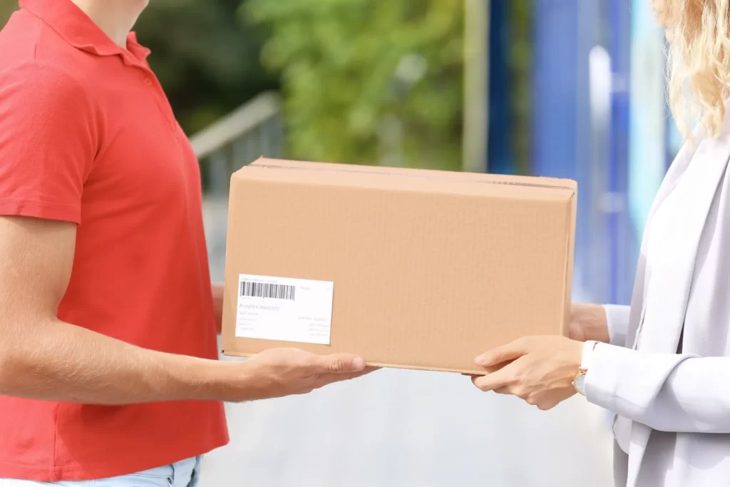 parcel delivery from man to blonde woman utc